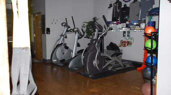 Indoor gym with stationary bikes and medicine balls