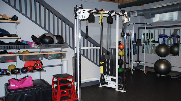 Home gym with cable machine and equipment