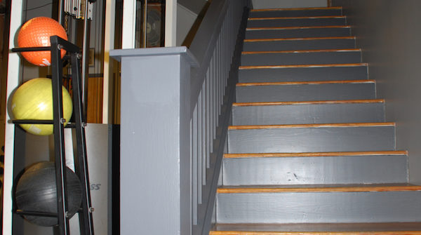 Gym staircase with medicine balls rack