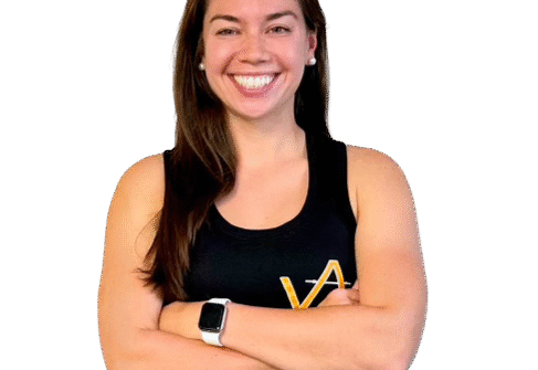 Smiling athletic woman with smartwatch, crossed arms